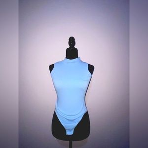 Blue ribbed bodysuit from Streetwear Society. Size small.